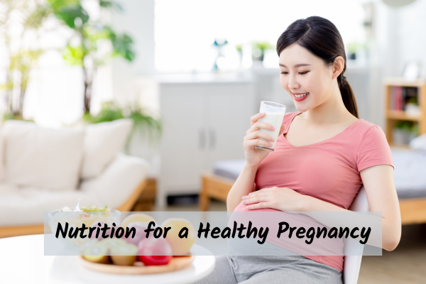a pregnant woman drinking milk