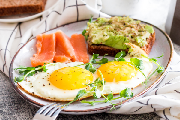 protein breakfast with eggs, salmon, and toast
