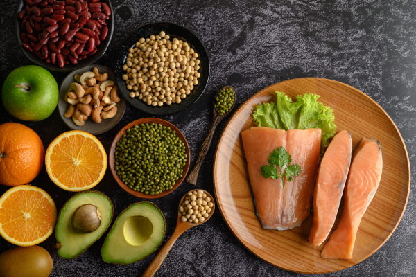 Healthy fats including salmon, avocado, and nuts