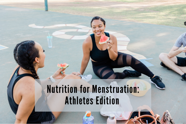 two athletes sitting discussing what they should be eating at different phases of the menstrual cycle