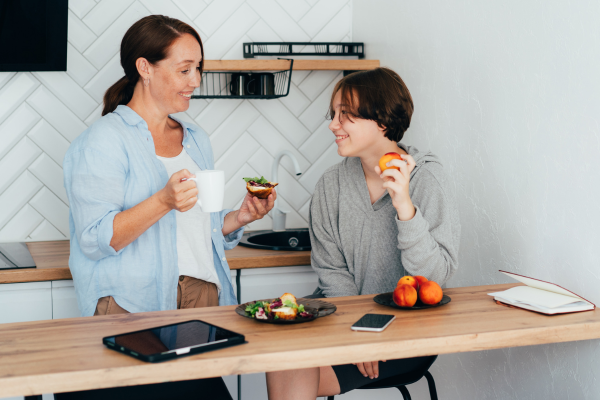 Mom with teenager reflecting the divison of Responsibility in Feeding