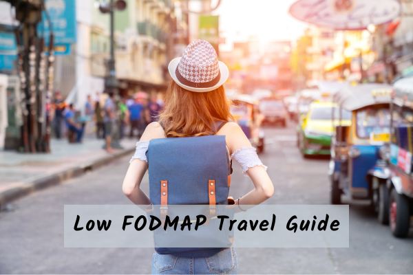 Low FODMAP Travel Guide Woman travelling with IBS in a new country with backpack