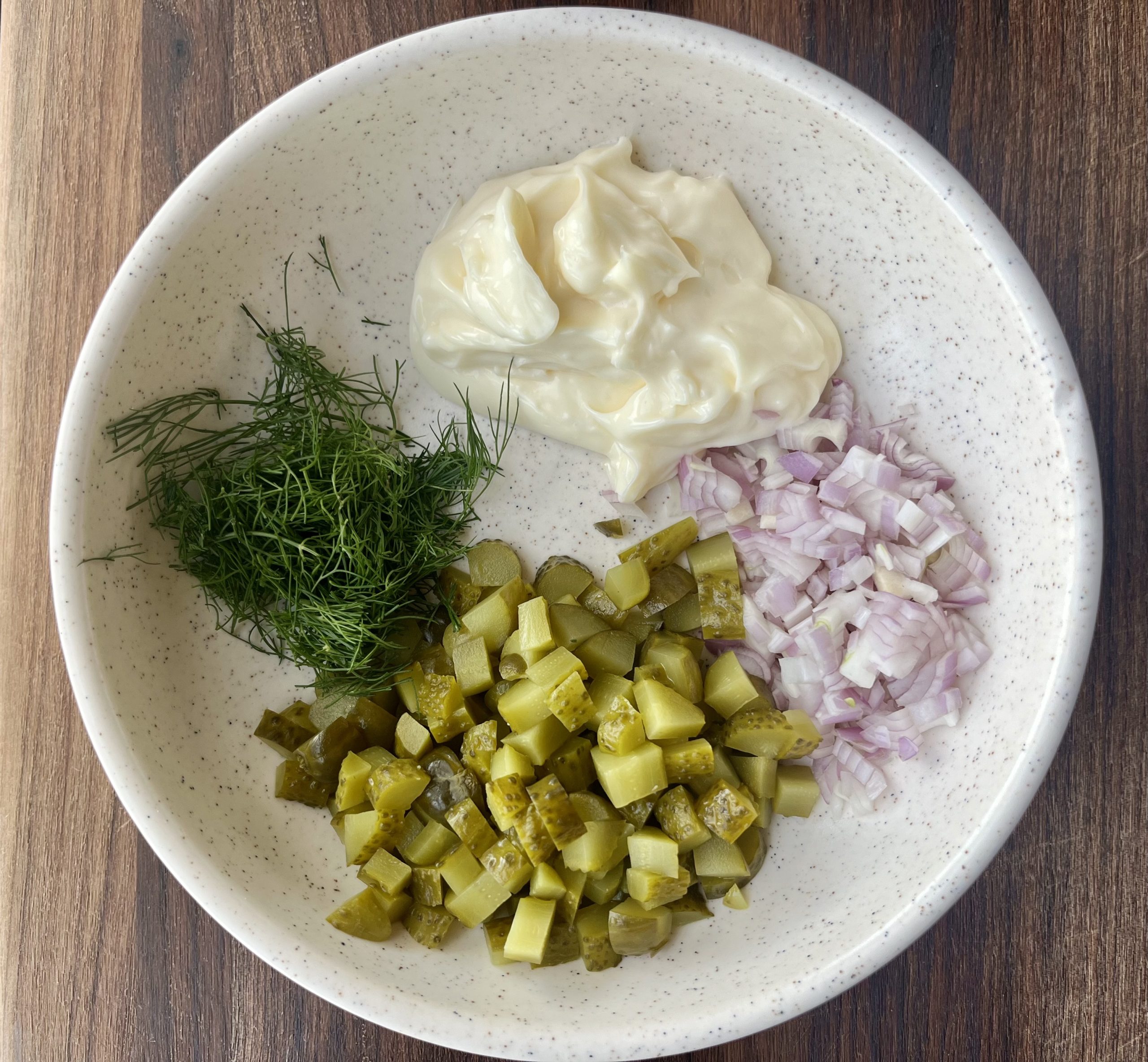 Simple Salmon Salad 3 bowl with chopped up shalot, dill, pickles, and mayo