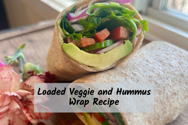 Loaded veggie and hummus wrap in a whole wheat tortilla