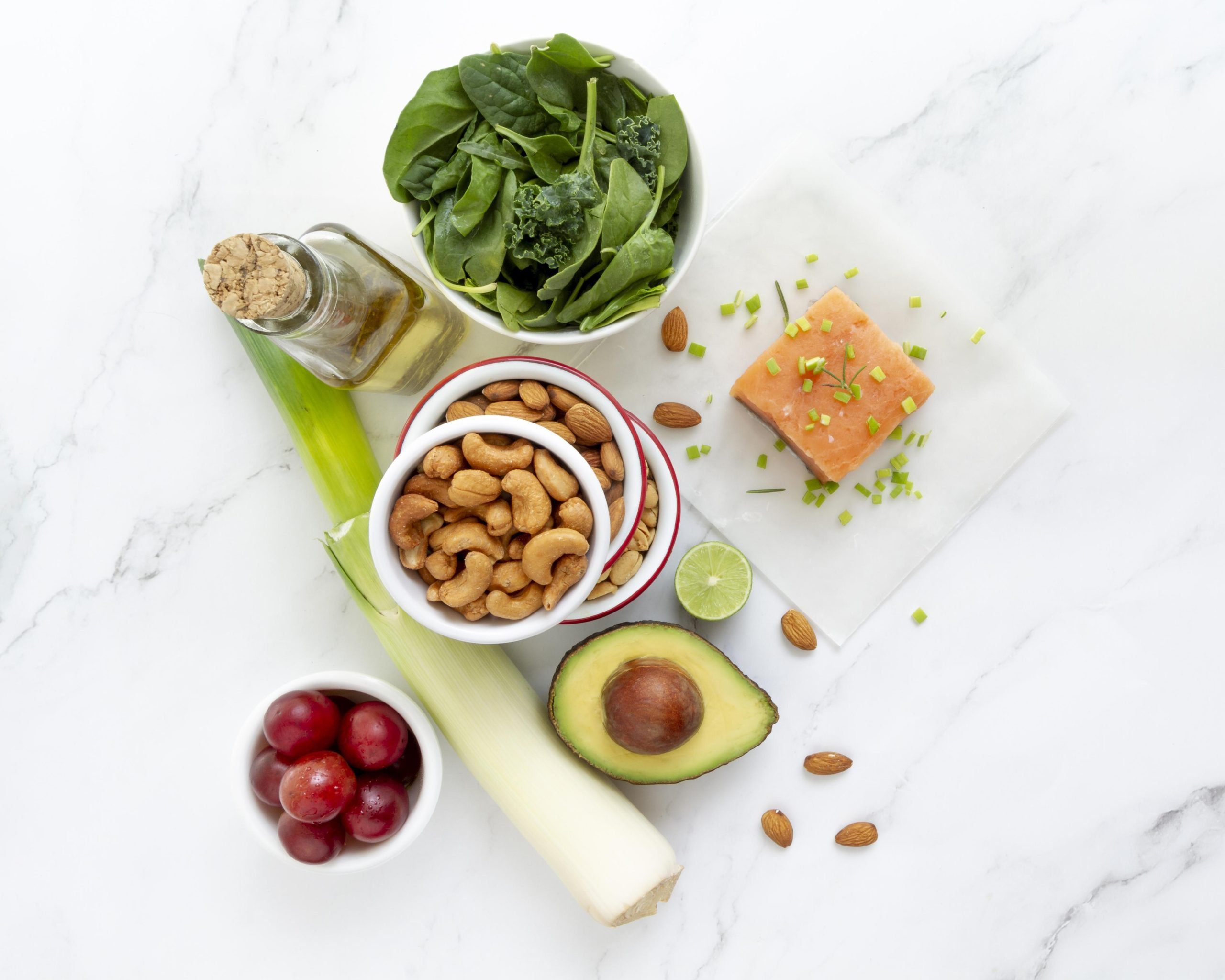tips_for_managing_high_blood_pressure picture containing cashews, avocado, salmon, vegetables