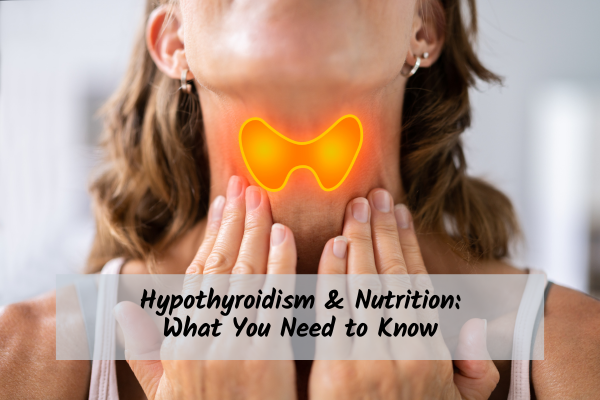 woman touching thyroid gland in neck