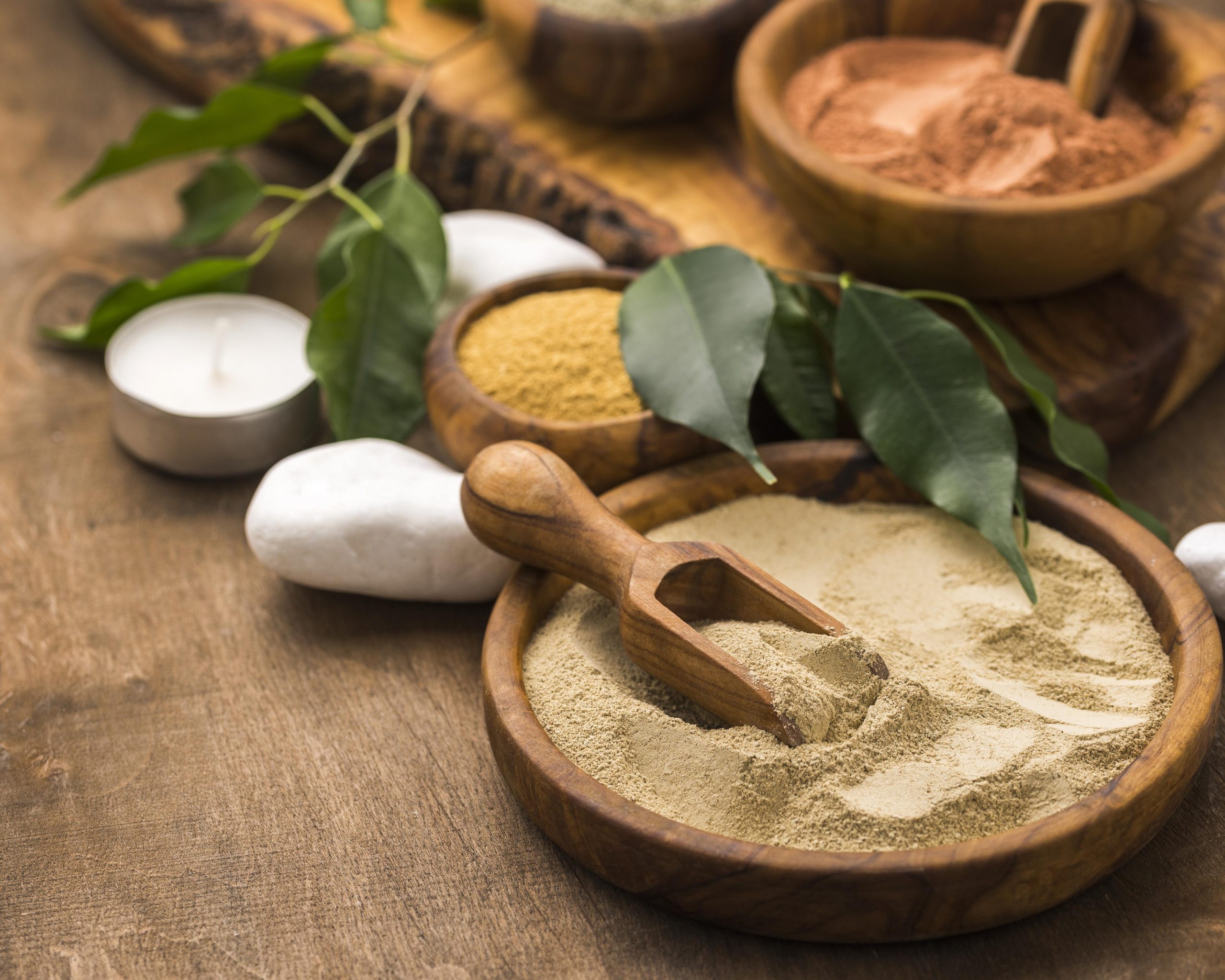 what_are_adaptogens ground adaptogens displayed in bowls on a table