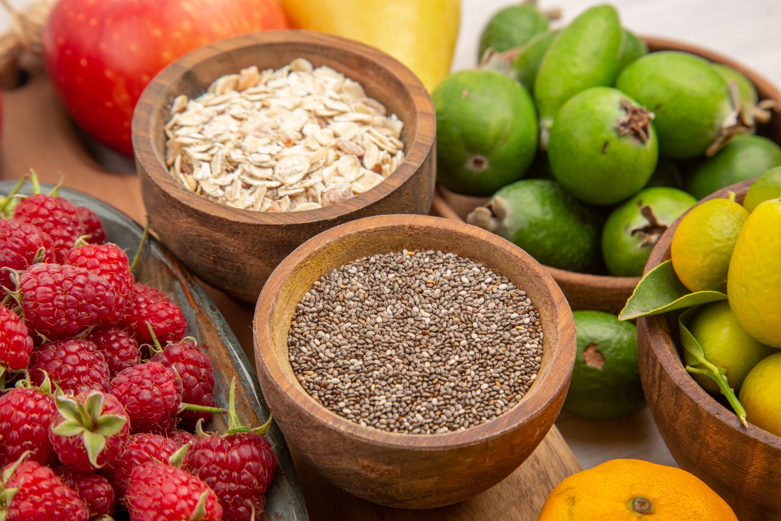 Raspberries, chia seeds, fruit, and oatmeal