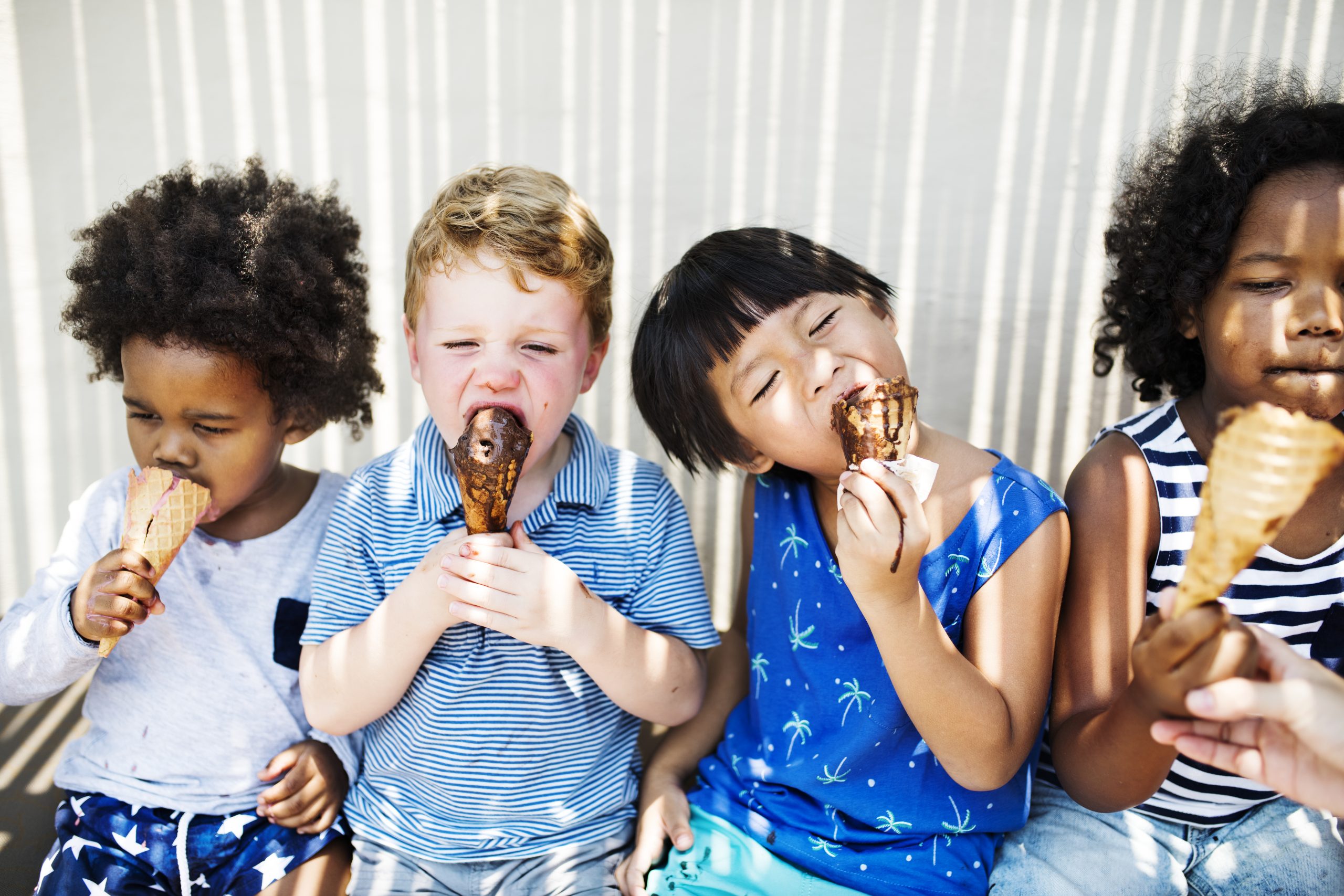 Children enjoying with ice cream kids eating ice cream to represent if children with adhd should eat sweets